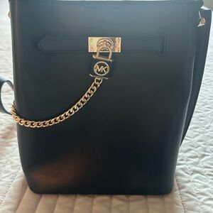 Michael Kors Black Bucket Bag with Gold Chain Detail